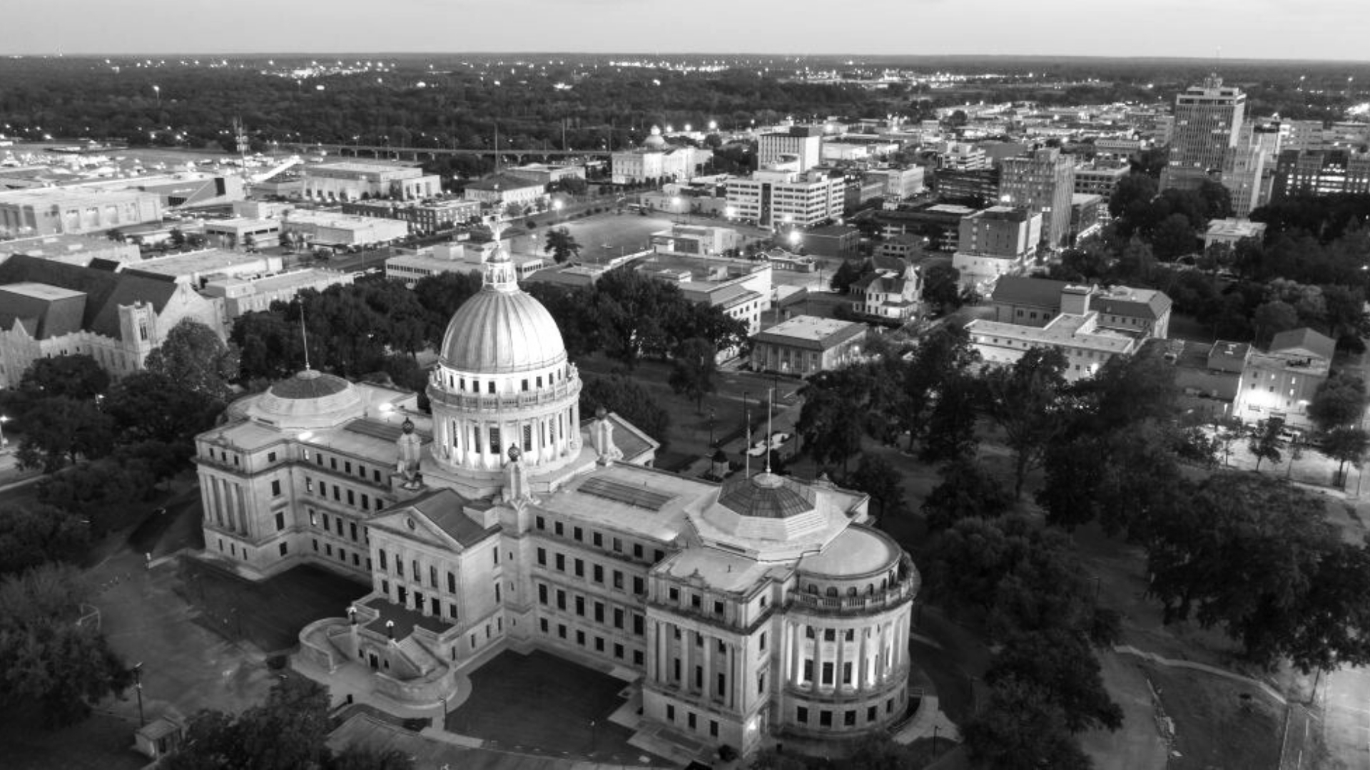 Waggoner - CCID Master Plan Aerial view of the Mississippi State Capitol building and surrounding downtown Jackson, Mississippi.